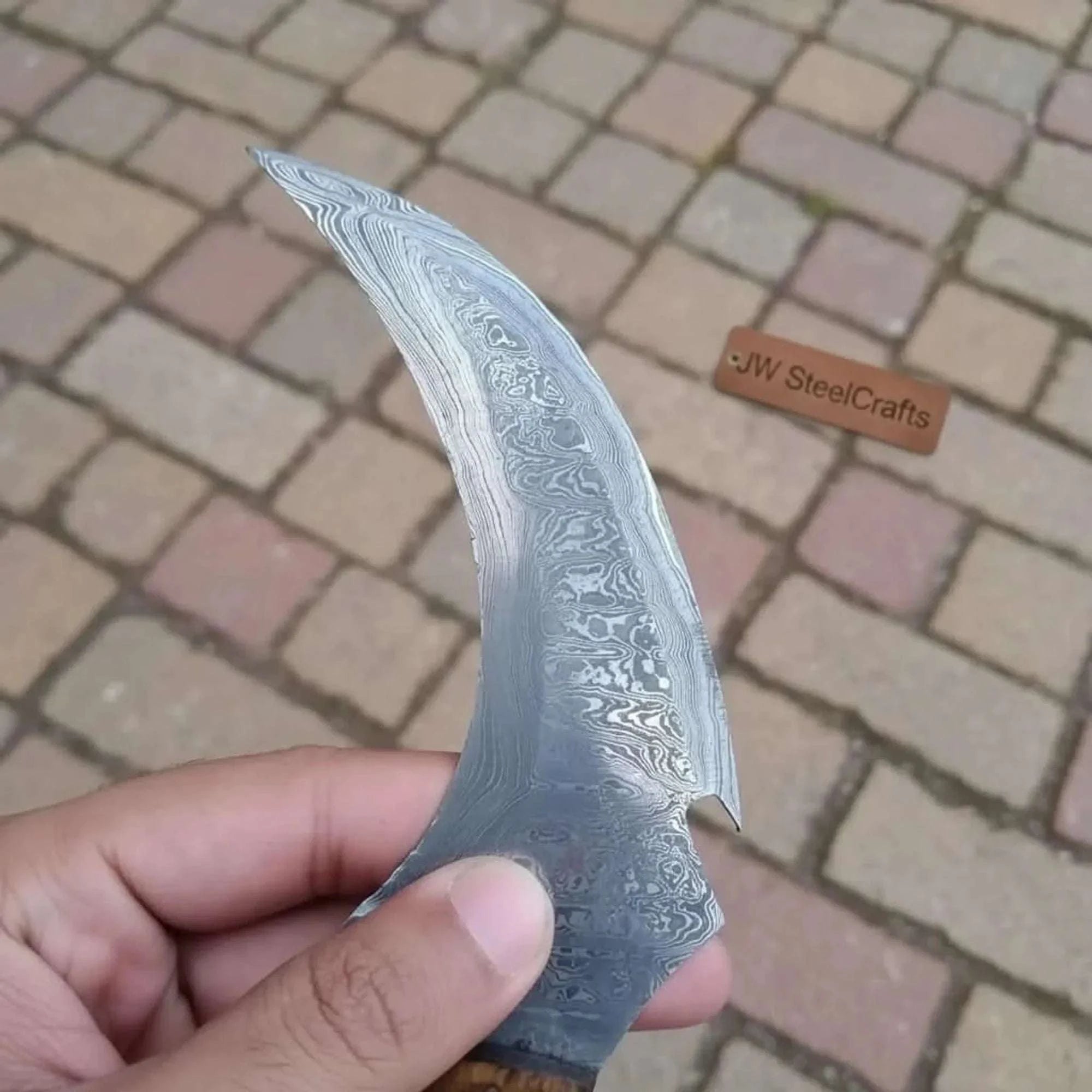 Palmarius Outdoors Damascus karambit knife.. karambit knife