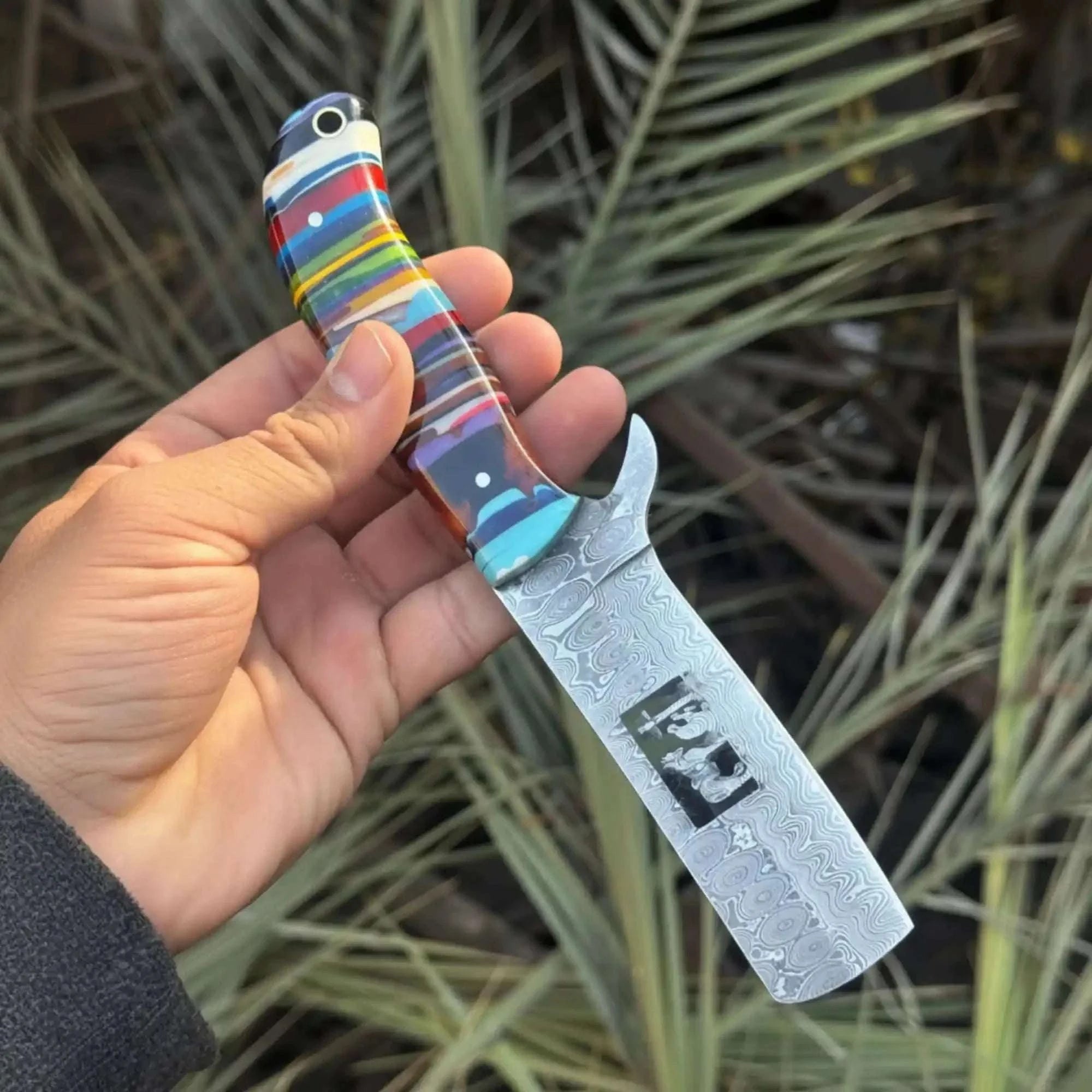 Palmarius Outdoors Damascus Bull Cutter Knife — Multi-Color Rainbow Resin Handle, Christian Cross Blade Engraving, Steel Bolster & Lanyard Hole Hunting Knife