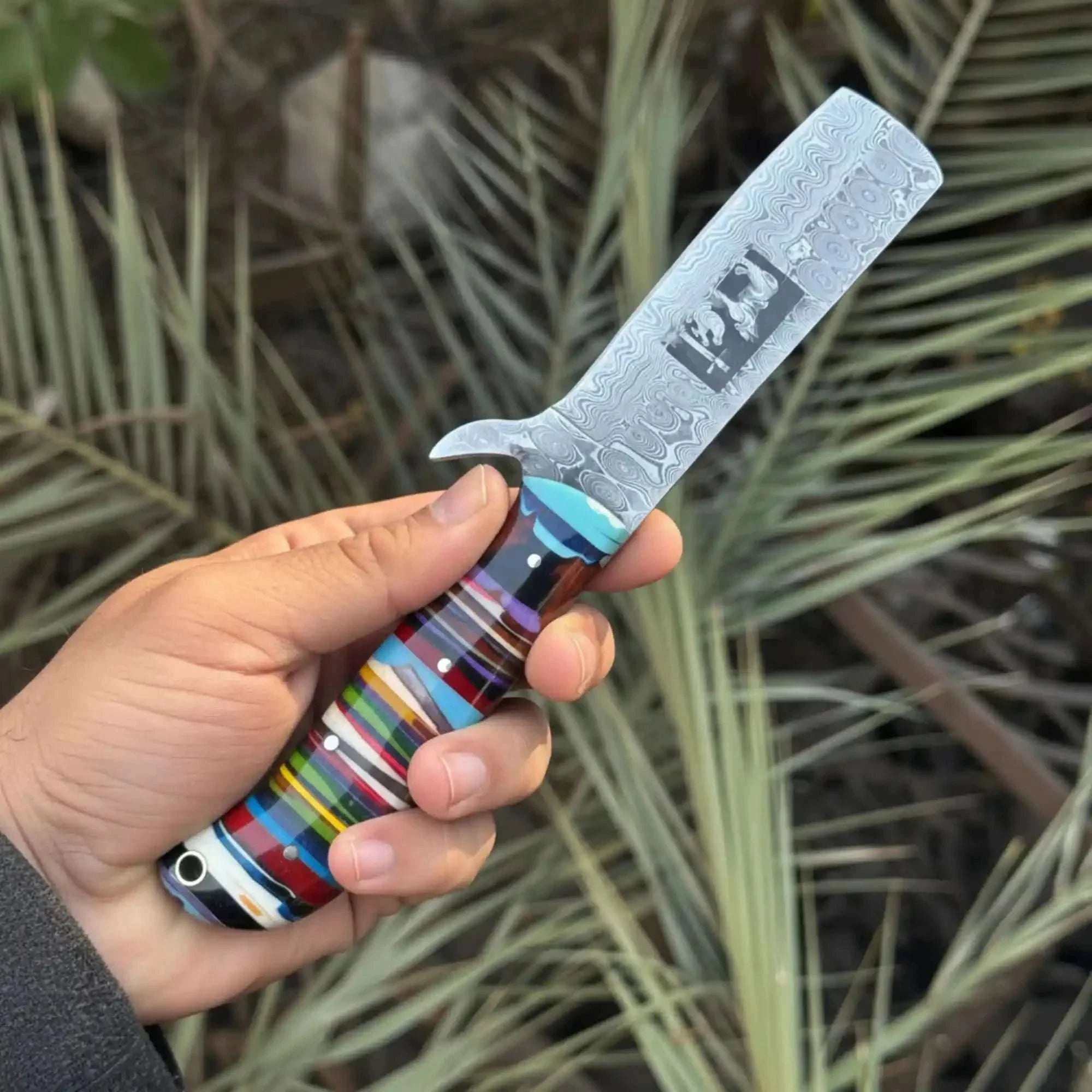 Palmarius Outdoors Damascus Bull Cutter Knife — Multi-Color Rainbow Resin Handle, Christian Cross Blade Engraving, Steel Bolster & Lanyard Hole Hunting Knife