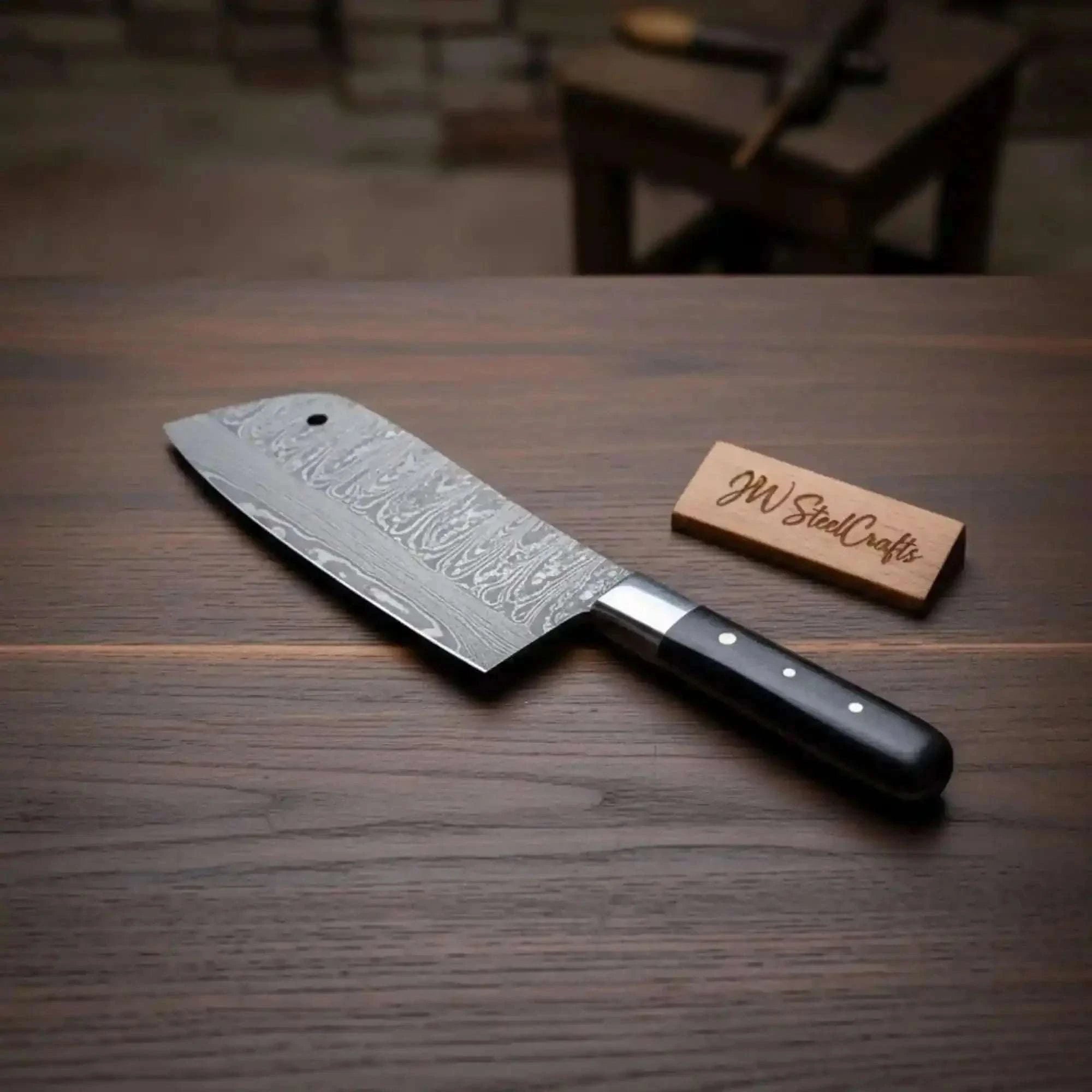 Palmarius Outdoors 7-Inch Forged Damascus Cleaver Knife — Twisted Pattern Blade, Grey Pakka Wood Handle, Steel Bolster & Hanging Hole | JW Steel Crafts Cleaver Knives