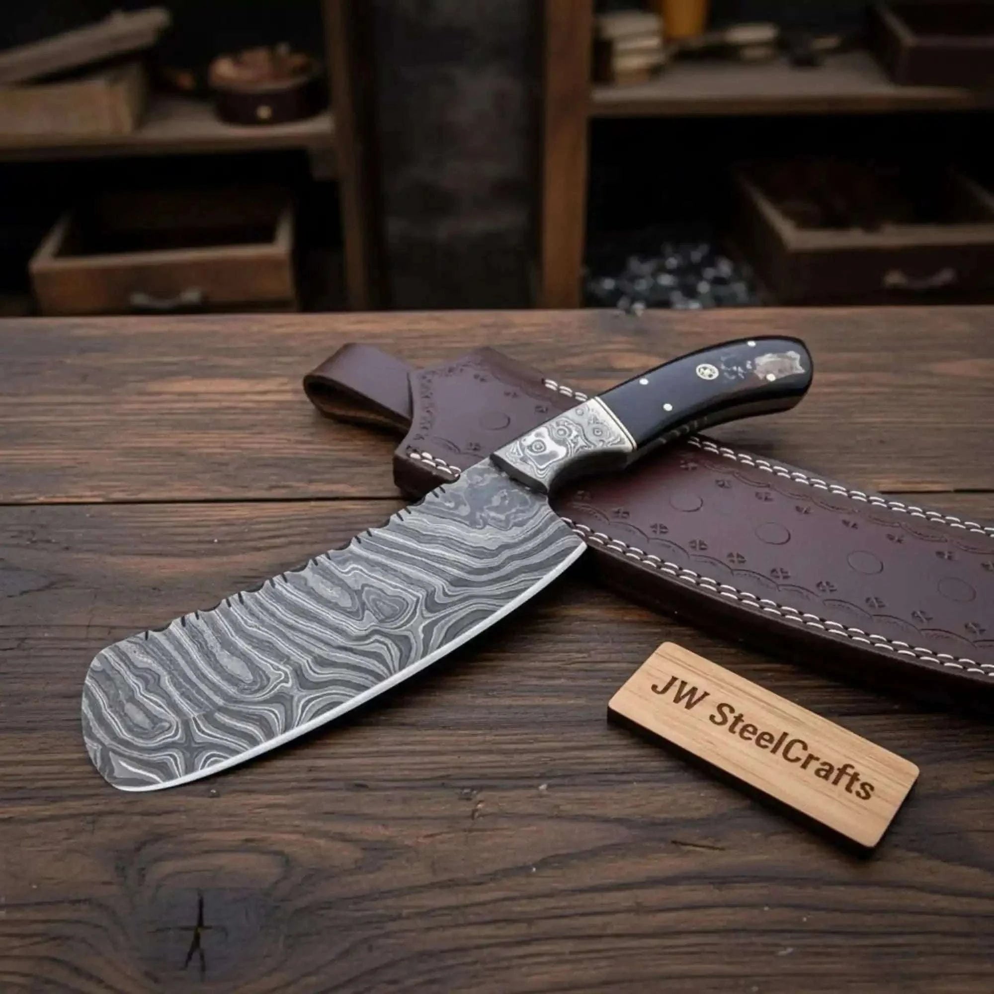 Palmarius Outdoors 10-Inch Forged Damascus Nakiri Chopper — Ladder Pattern Blade, Engraved Damascus Bolster, Black Resin Handle & Tooled Leather Sheath Skinner Knife